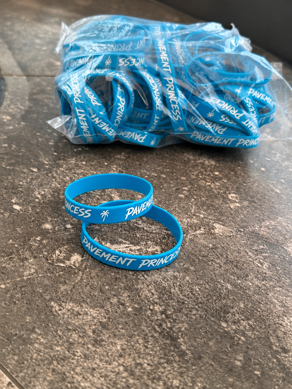 Blue "pavement princess" phone holder / bracelet